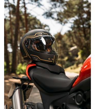 By City 90 Degrees gold carbon helmet